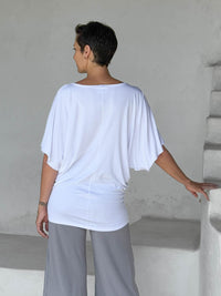caraucci white kimono tunic worn as a tunic with stone pants #color_white