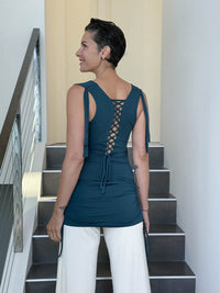 women's plant-based stretchy rayon jersey teal blue drape front tunic with adjustable side ruching and lace up back #color_teal