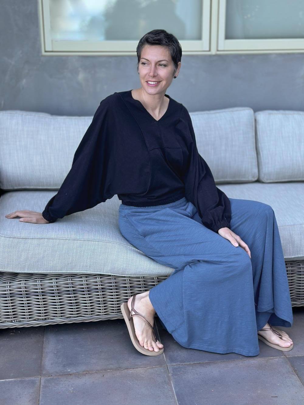 caraucci long sleeve black cotton v neck dolman long sleeve top #color_black