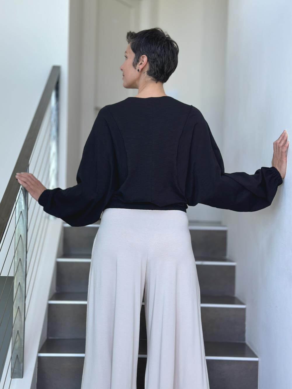 caraucci long sleeve black cotton v neck dolman long sleeve top #color_black