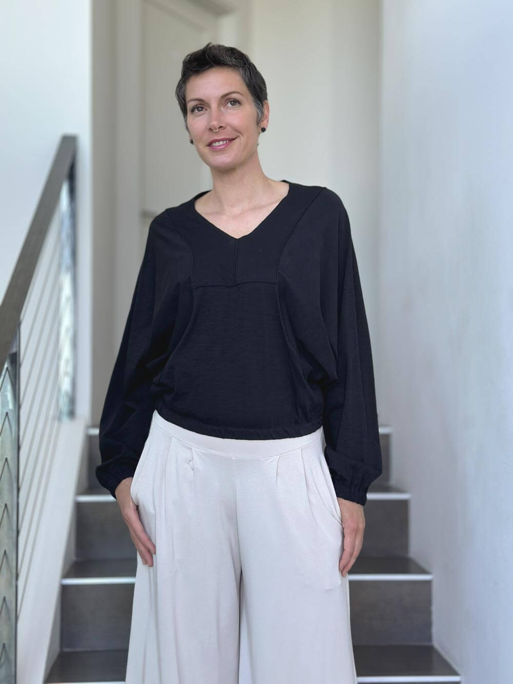 caraucci long sleeve black cotton v neck dolman long sleeve top #color_black