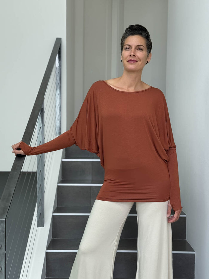 caraucci women's plant-based lightweight loose fit burnt orange long sleeve rayon jersey top with thumbholes #color_copper