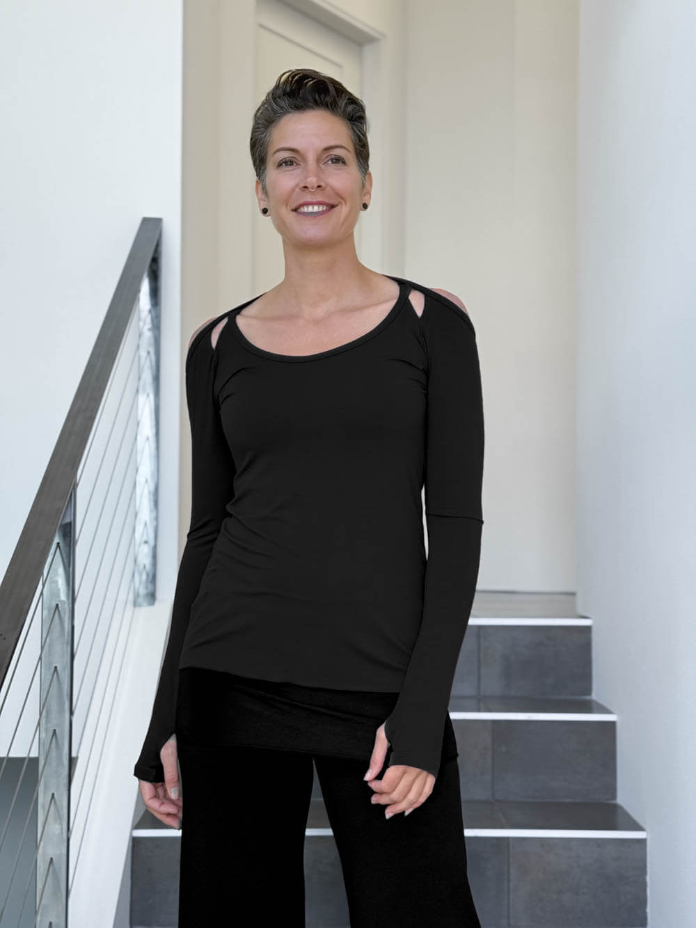 women's plant based stretchy rayon jersey black peekaboo long sleeve top with thumbholes #color_black