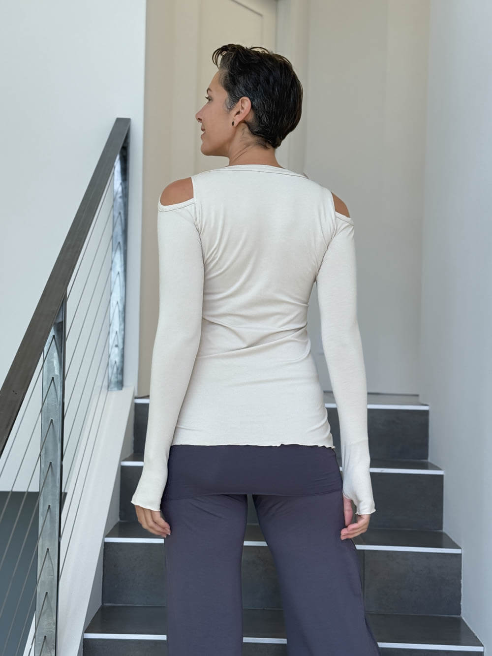 women's plant based stretchy rayon jersey long sleeve peekaboo shoulder cream top with thumbholes #color_cream