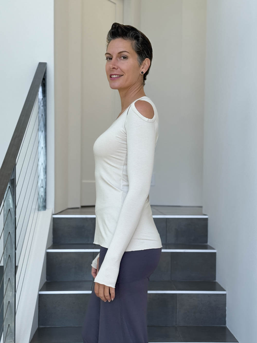 women's plant based stretchy rayon jersey long sleeve peekaboo shoulder cream top with thumbholes #color_cream