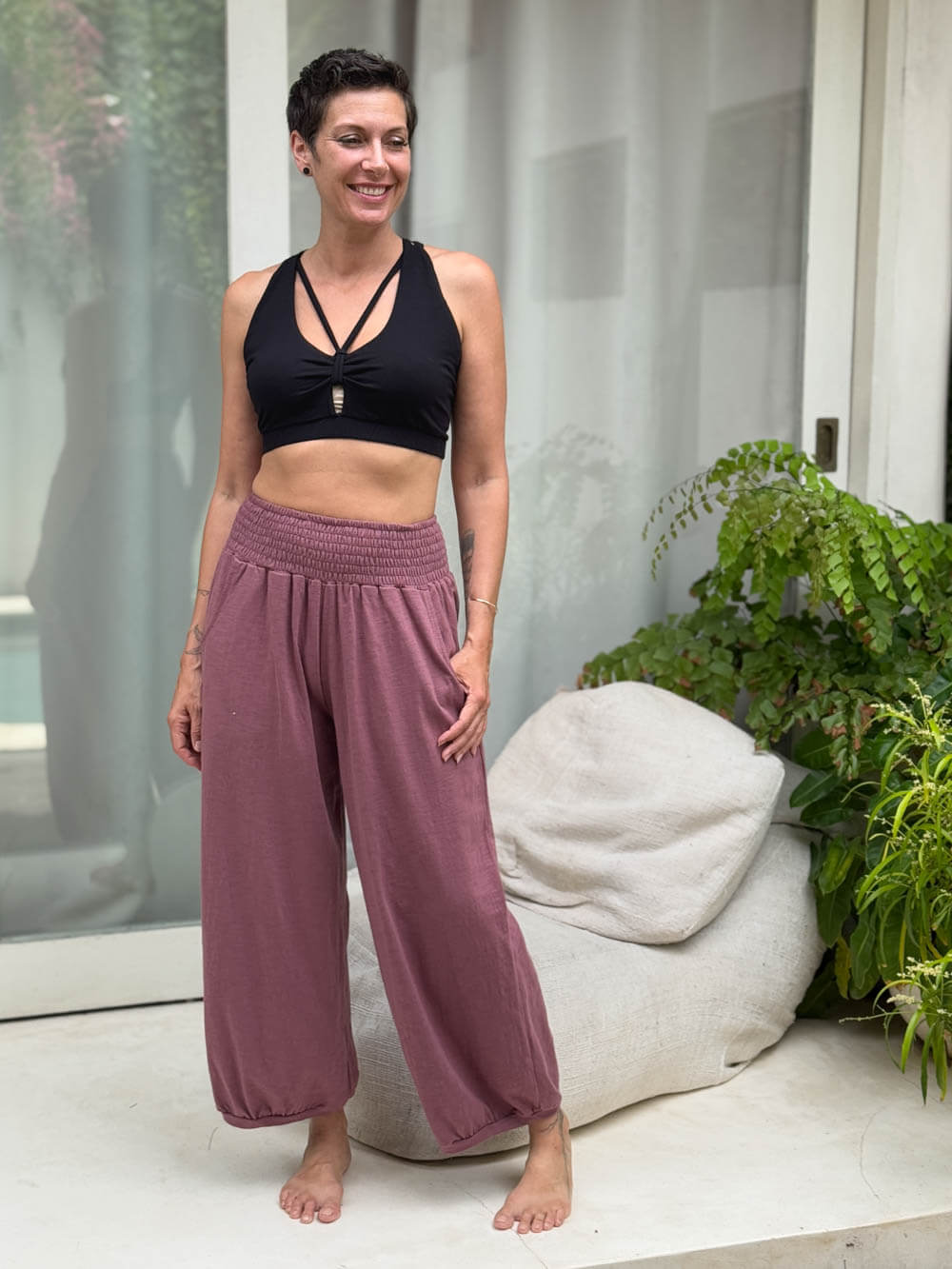 caraucci stretchy full coverage black yoga bra top with criss cross back straps #color_black