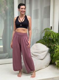 caraucci stretchy full coverage black yoga bra top with criss cross back straps #color_black