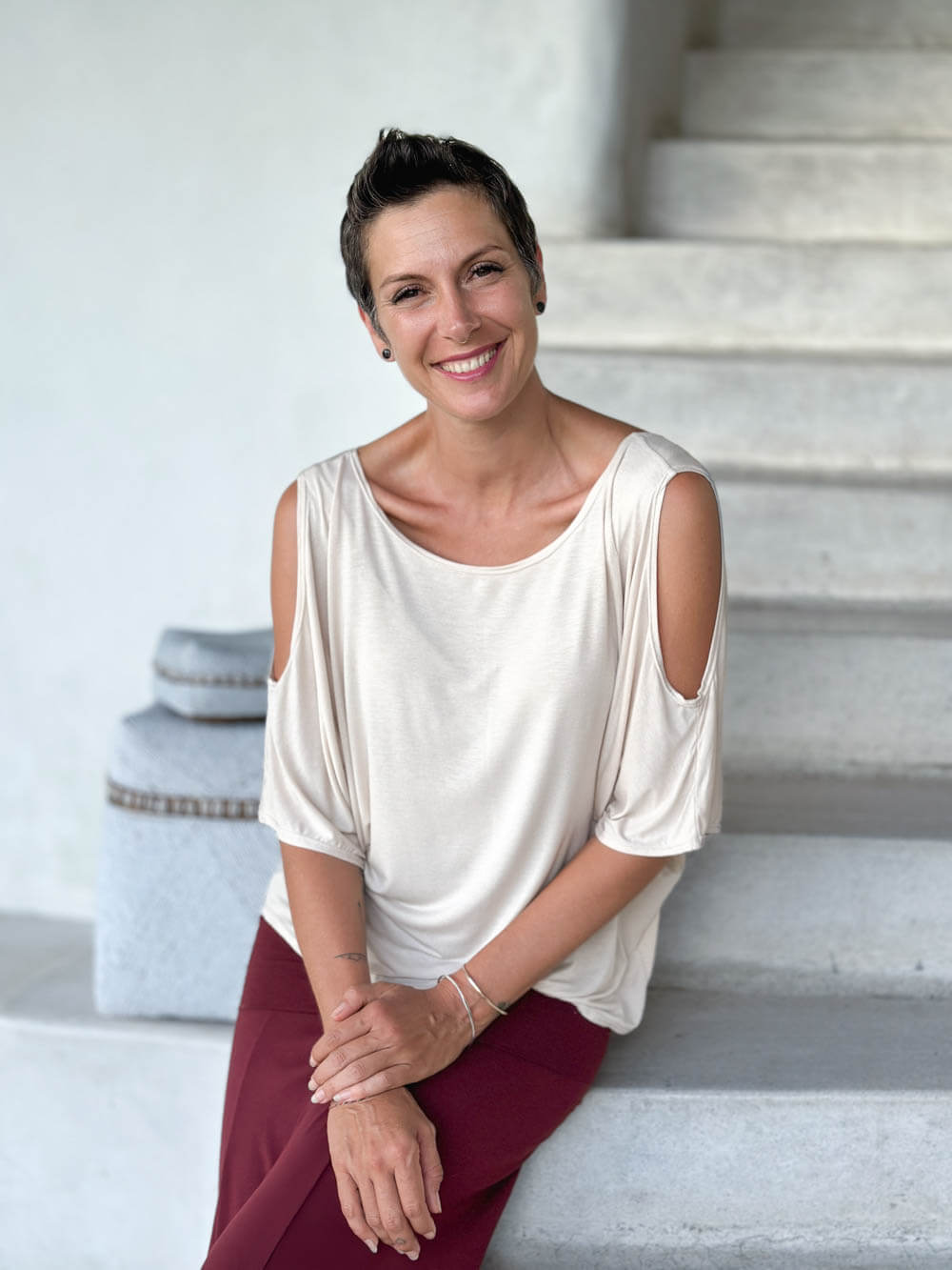 caraucci loose oversized peekaboo shoulder short sleeve cream top #color_cream