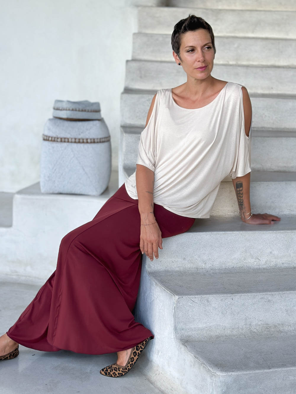caraucci loose oversized peekaboo shoulder short sleeve cream top #color_cream