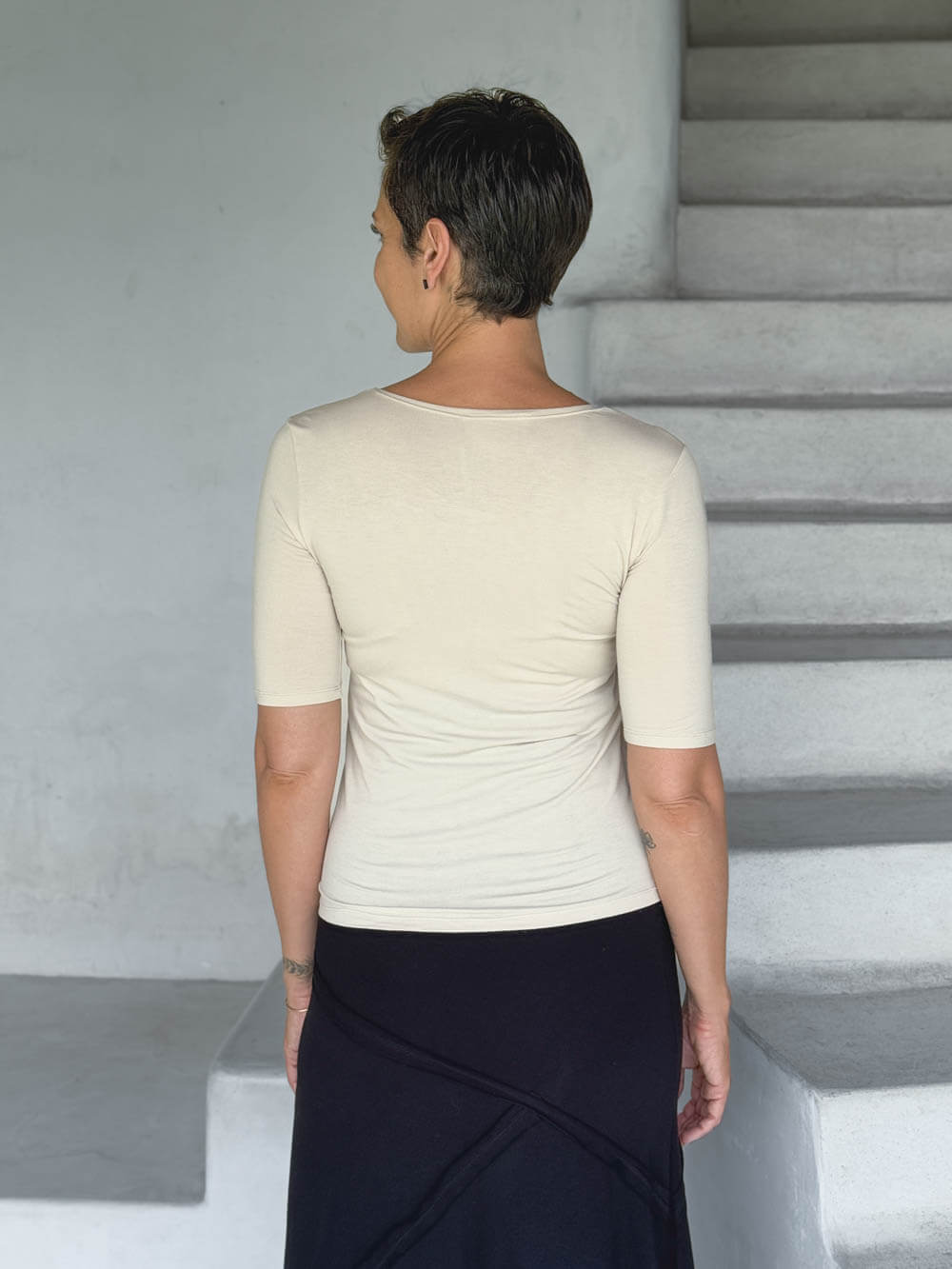 caraucci jersey round neck fitted short sleeve cream top #color_cream