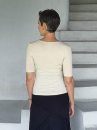 caraucci jersey round neck fitted short sleeve cream top #color_cream