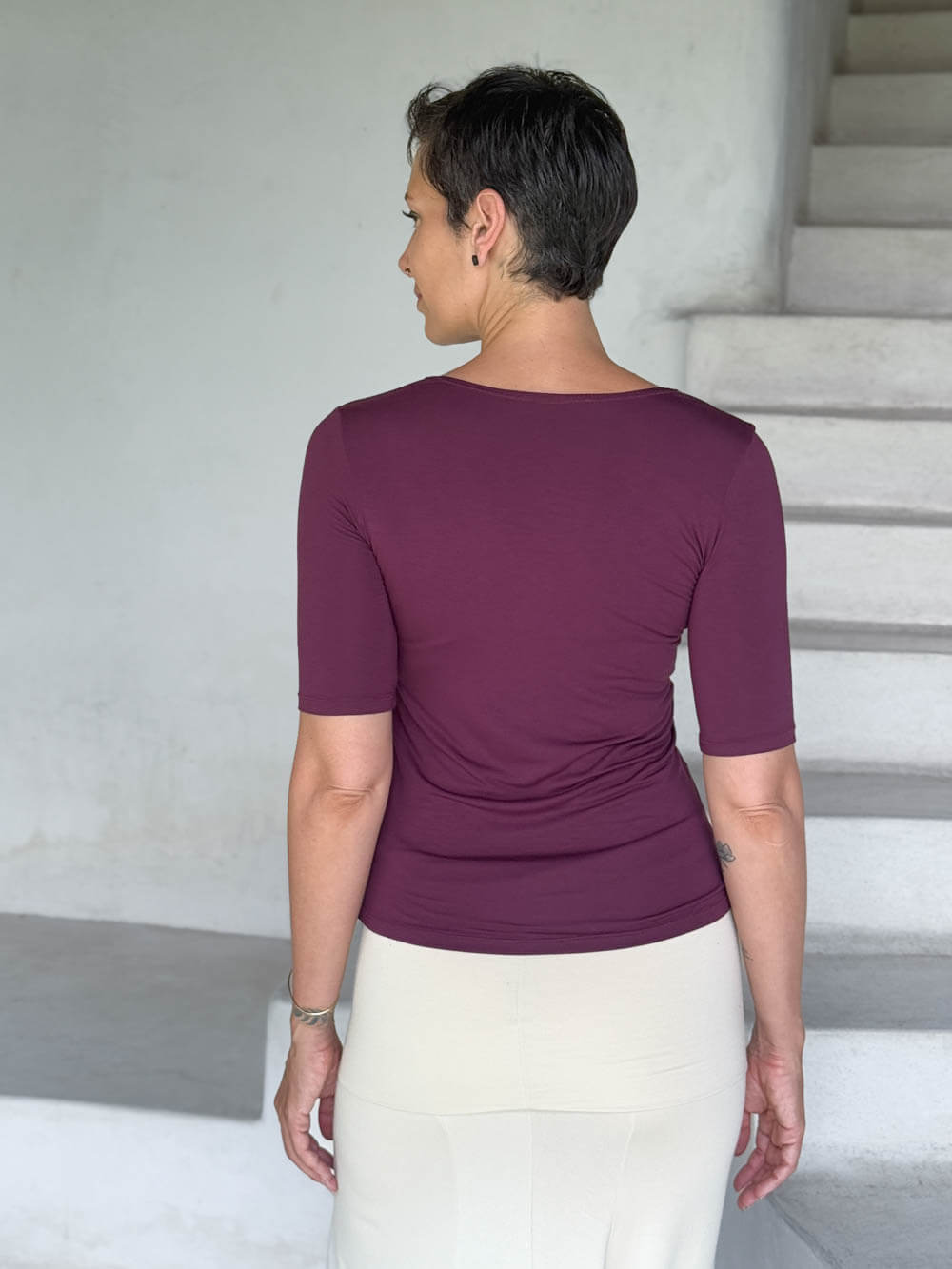 caraucci jersey round neck fitted short sleeve purple top back view #color_jam
