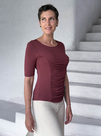 caraucci jersey round neck fitted short sleeve maroon top #color_wine