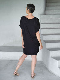 caraucci-woman-wearing-black-v-neck-tunic-as-a-dress #color_black