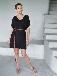 caraucci-woman-wearing-black-v-neck-tunic-as-a-dress-with-a-belt #color_black