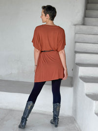 caraucci-woman-wearing-copper-v-neck-tunic-and-black-leggings-and-belt #color_copper