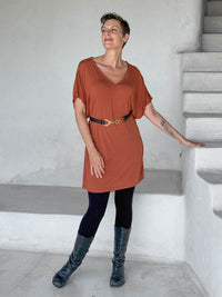caraucci-woman-wearing-copper-v-neck-tunic-and-black-leggings-and-belt #color_copper