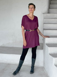 caraucci-woman-wearing-purple-v-neck-tunic-and-black-leggings-and-belt #color_jam