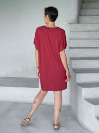 caraucci-woman-wearing-red-v-neck-tunic-as-a-dress #color_scarlet