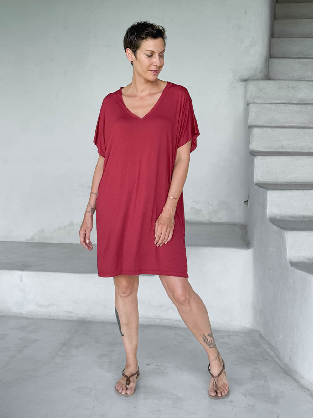 caraucci-woman-wearing-red-v-neck-tunic-as-a-dress #color_scarlet