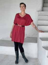 caraucci-woman-wearing-red-v-neck-tunic-and-black-leggings-and-belt #color_scarlet