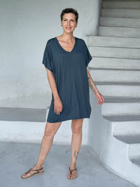 caraucci-woman-wearing-teal-v-neck-tunic-as-a-dress #color_teal