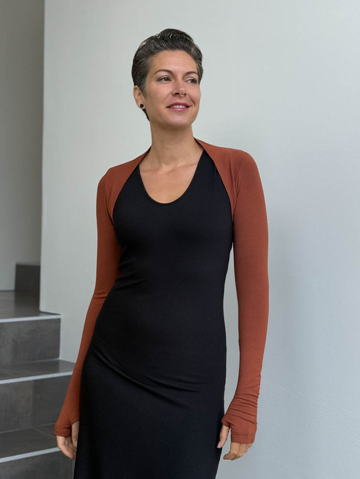 women's plant based rayon jersey stretchy orange sleeve shrug with thumbholes #color_copper