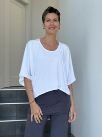 caraucci loose round neck white dolman short sleeve top #color_white