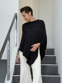 caraucci women's plant based rayon jersey black textured poncho can be worn multiple ways; dress, skirt, halter top #color_black