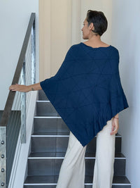 caraucci women's plant based rayon jersey navy blue textured poncho can be worn multiple ways; dress, skirt, halter top #color_navy