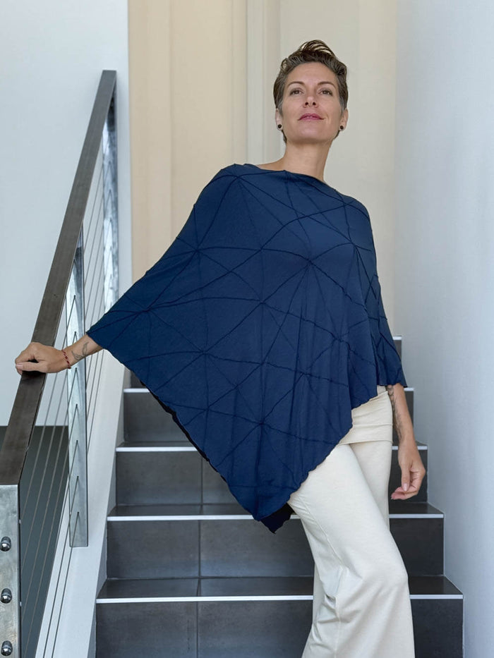 caraucci women's plant based rayon jersey navy blue textured poncho can be worn multiple ways; dress, skirt, halter top #color_navy