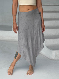 caraucci texture poncho worn as a skirt #color_stone