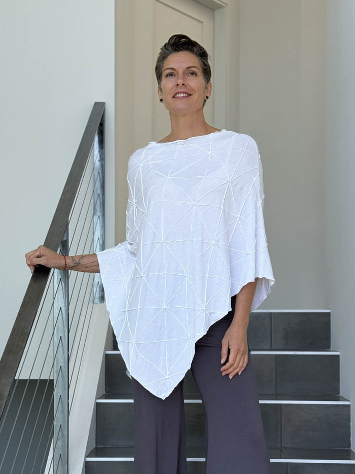 caraucci women's plant based rayon jersey white textured poncho can be worn multiple ways; dress, skirt, halter top #color_white