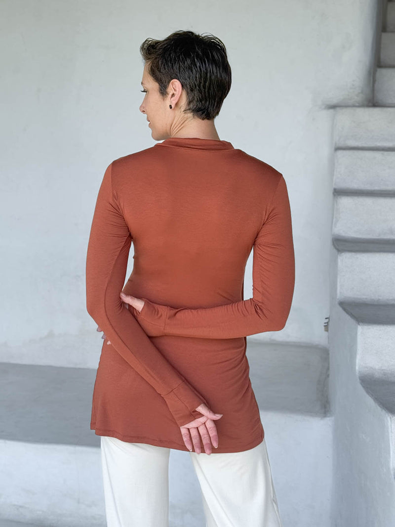 caraucci v-neck long sleeve orange tunic with thumbholes #color_copper