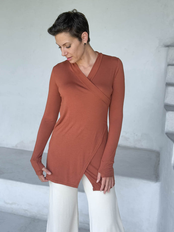 caraucci v-neck long sleeve orange tunic with thumbholes #color_copper