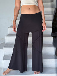 women's skirt over black wide leg pants with raised diagonal stitching #color_black