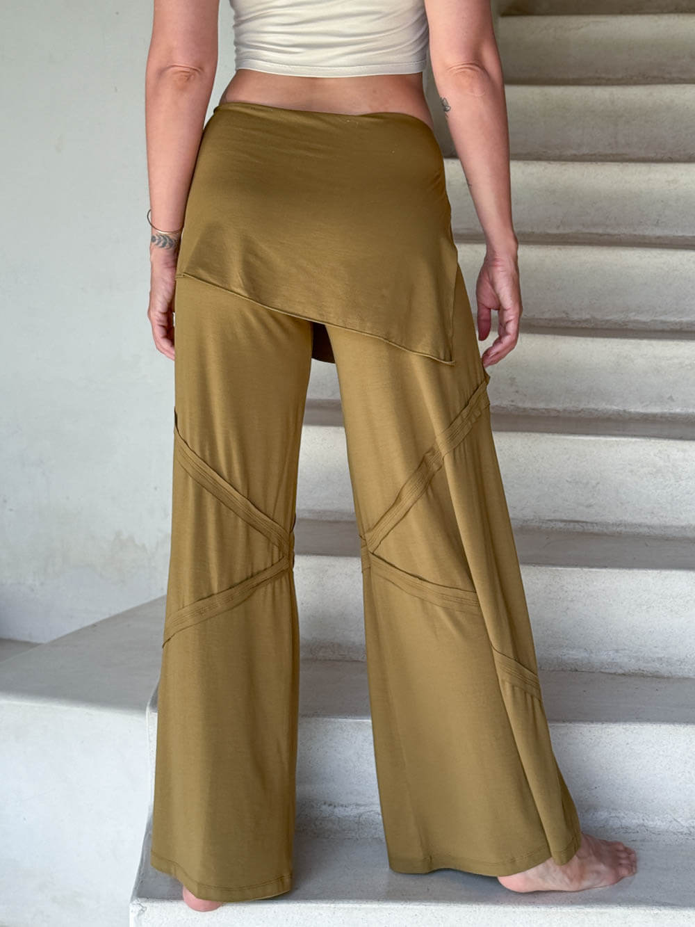 women's skirt over brass color wide leg pants with raised diagonal stitching #color_brass