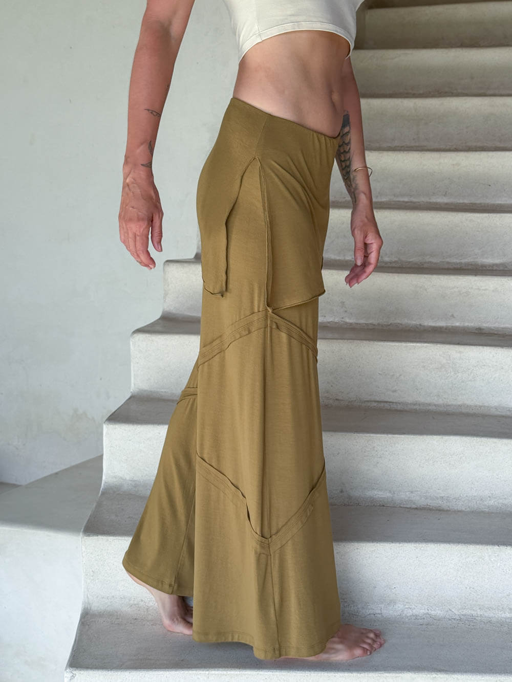 women's skirt over brass color wide leg pants with raised diagonal stitching #color_brass