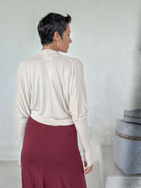 women's plant based rayon jersey loose fit cream dolman sleeve shrug with thumbholes #color_cream