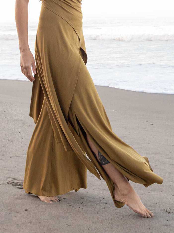 caraucci stretch jersey green brass wide-leg side slit full-length flow pants #color_brass