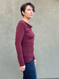 women's plant based rayon jersey long sleeve maroon top with slight cowl neck and side ruching #color_wine