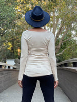 women's plant based rayon jersey long sleeve cream top with slight cowl neck and side ruching #color_cream