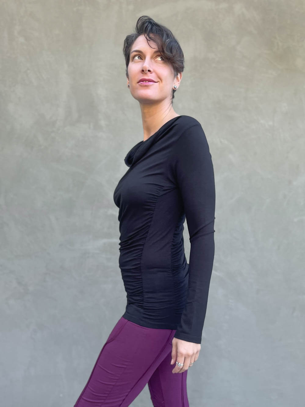 women's plant based rayon jersey long sleeve black top with slight cowl neck and side ruching #color_black