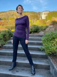 women's bamboo spandex pants with raised stitch details and 2 zipper pockets #color_black