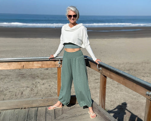 caraucci bamboo fleece white cropped poncho and cotton ojai pants in matcha color