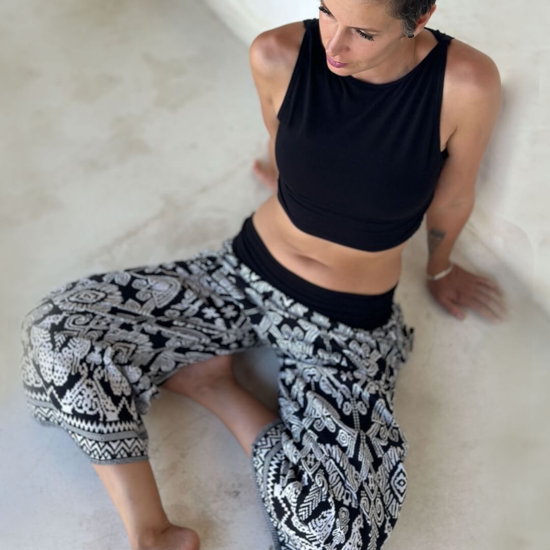caraucci limited edition sulawesi black and white print pants and black cropped top