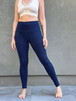 caraucci women's bamboo spandex full length navy blue pocket leggings with a fold over waistband #color_navy