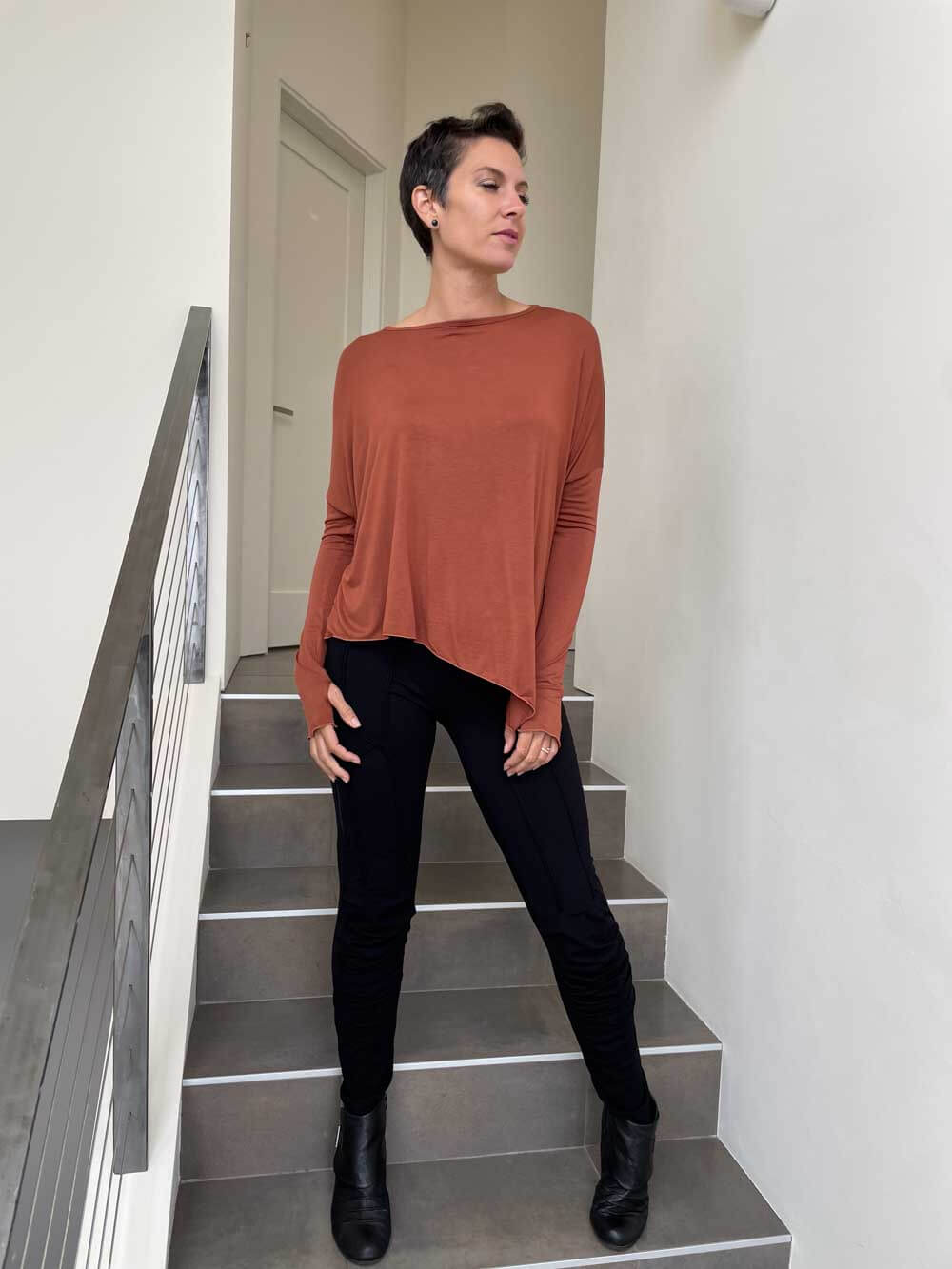 caraucci plant-based rayon jersey rust asymmetrical hem oversized long sleeve top with thumbholes #color_copper