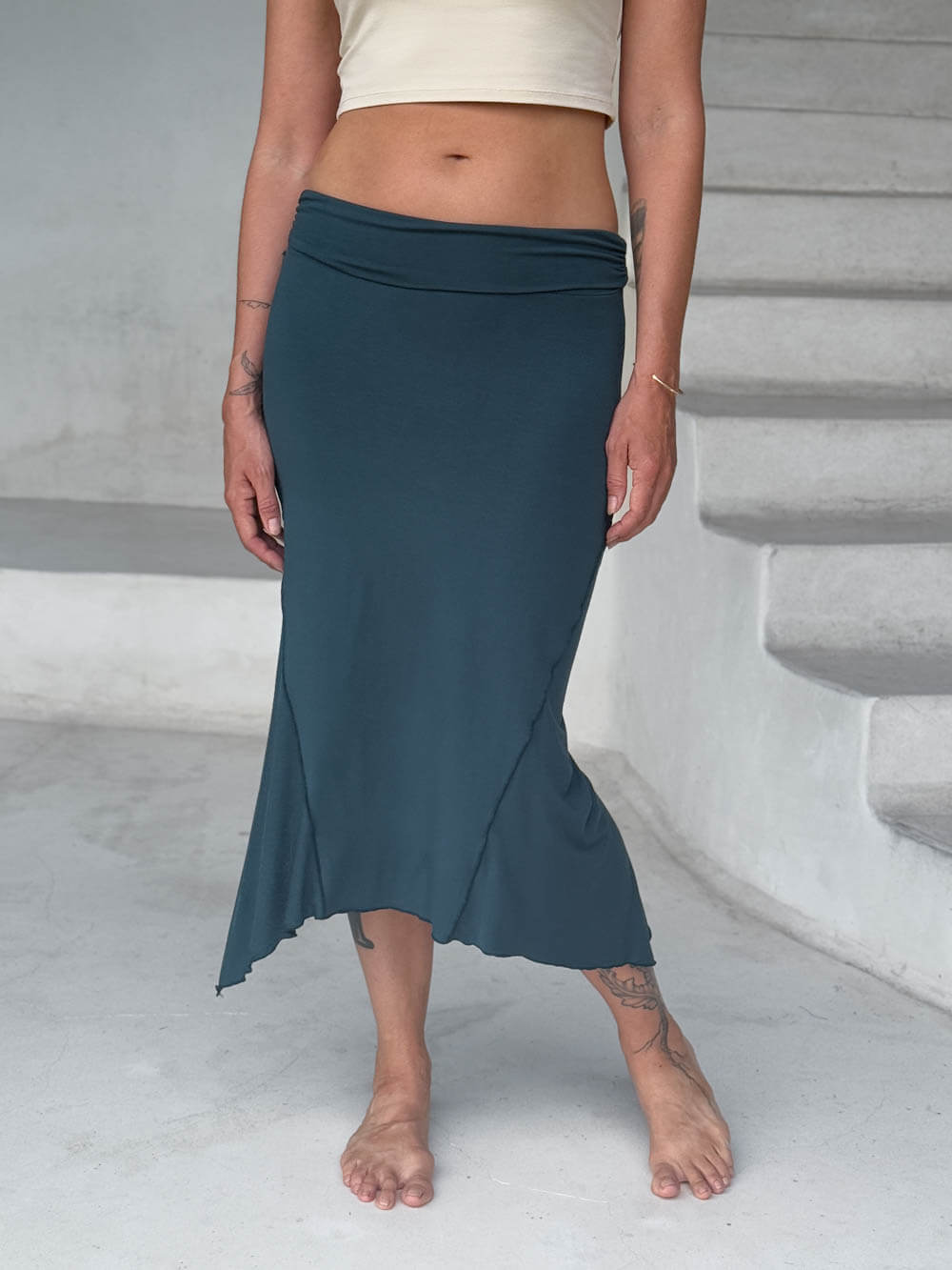 caraucci stretch rayon jersey asymmetrical teal blue midi skirt #color_teal