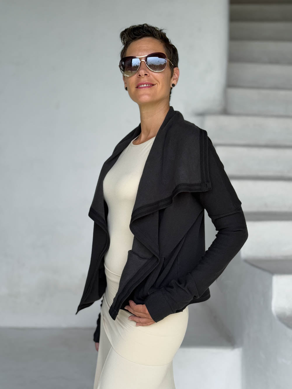 caraucci black bamboo fleece jacket, shown open with a draped shawl color with thumbholes and pockets #color_black